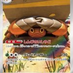 Crustle Japanese Art Rare card #067/063 peeking out from beneath its massive stone shell in a warm outdoor setting.