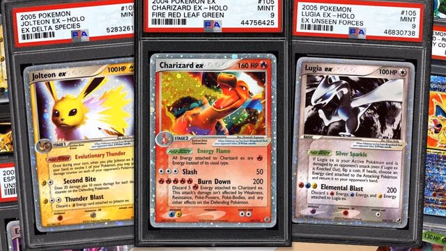 A display of EX Pokemon PSA cards arranged neatly, showcasing various characters and artwork.