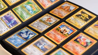 A binder filled with various Pokémon cards, showcasing a colorful collection of characters and game elements.